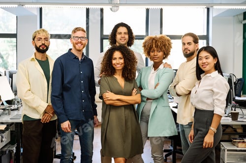 Preview: Portrait of the multicultural group of coworkers standing in the office