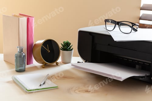 Preview: White scanner or printer machine on a table close up