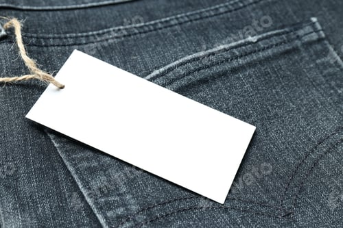 Preview: Ukraine, Kyiv, 08.10.2023 Tag on jeans close-up