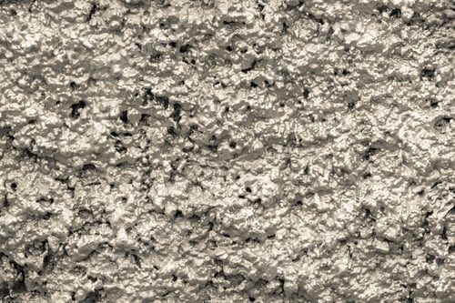 Preview: Bumpy Texture Of A Rough Shapeless Shining Surface Of A Wall Of Cream Color For Empty Abstract