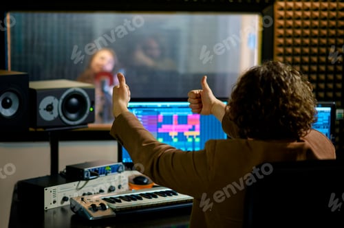 Preview: Male musician and female singer, recording studio