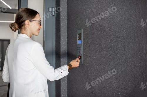 Preview: Woman opening the door with keychain