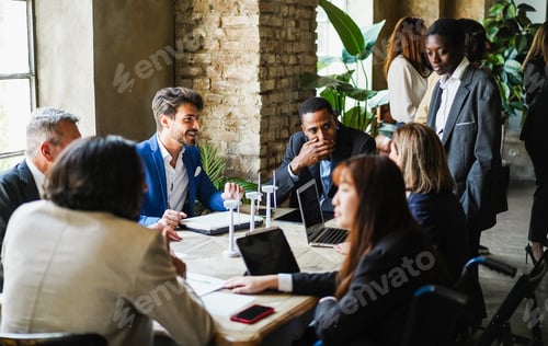 Preview: Multiracial business people working on sustainable innovation project