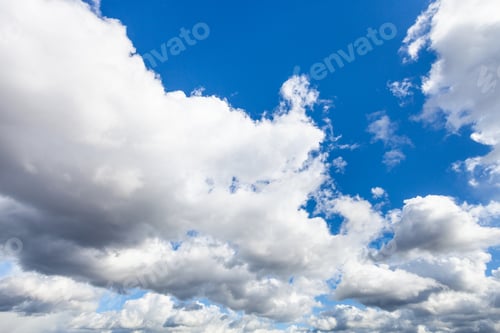 Preview: low cumulus clouds in dark blue sky in september