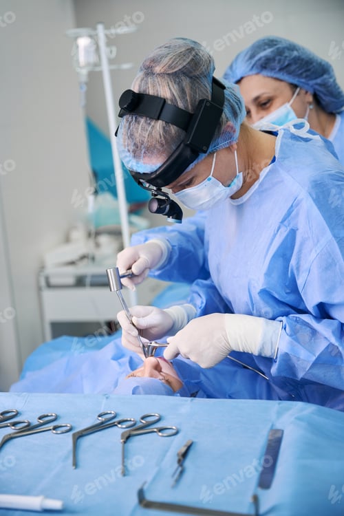 Preview: Surgical Team Performing Operation in Hospital Setting