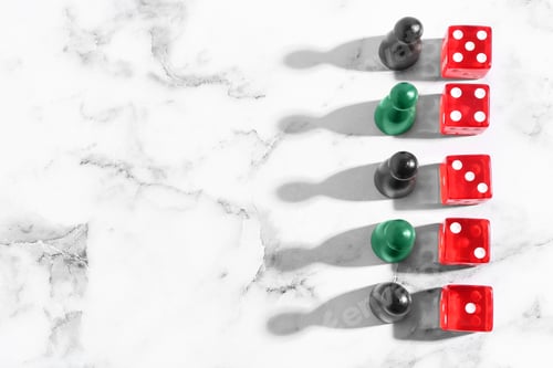 Preview: Red dices and game pieces on white marble table, flat lay. Space for text
