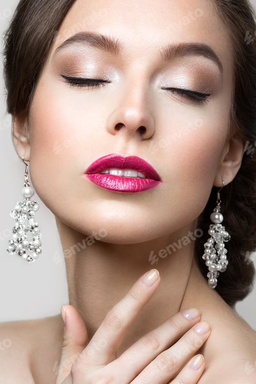 Preview: Portrait of a beautiful woman in the image of the bride with flowers in her hair. Beauty face.