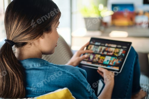 Preview: Woman Choosing Movie For Streaming On Tablet