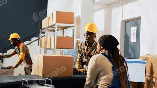 Preview: Team of workers planning shipment for retail store