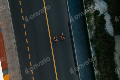 Preview: Aerial view of two girls jogging