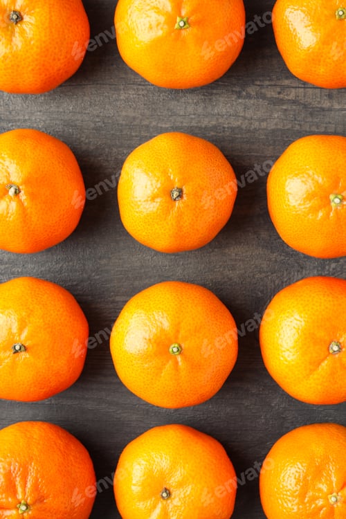Preview: Flat lay with tasty mandarins on textured wooden table