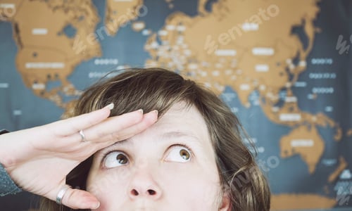 Preview: Wanderlust concept image of a woman near a world map