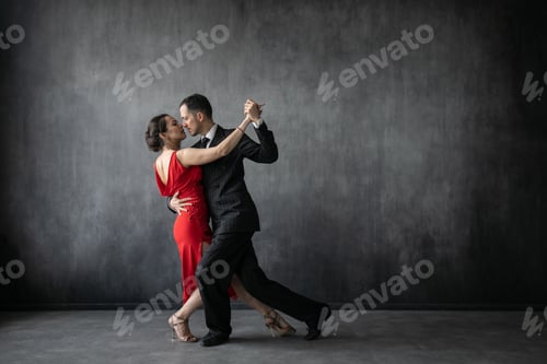 Preview: Couple of tango dancers pose in a dancing movement
