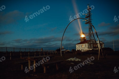Preview: Road and lighthouse in evening