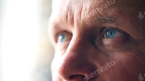 Preview: Macro Studio Expression Shot Of Senior Man's Eyes With Close Up On Eyelashes And Pupil