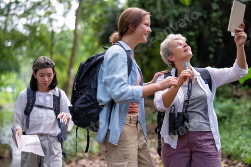 Preview: Backpack tourist travel outdoor adventure bird study using binoculars looking and record to book