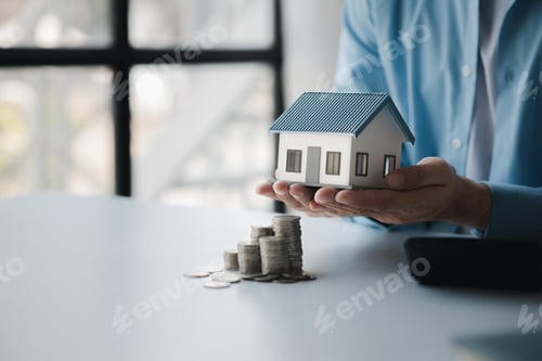 Preview: Person with stack of coins, saving money concept for future use and financial stability, savings for