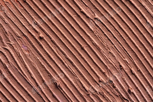Preview: Textured smears of dark skin foundation, background