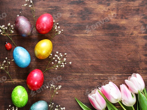 Preview: Easter composition with eggs and flowers on a wooden background