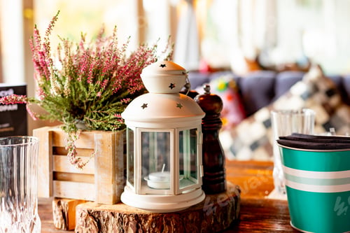 Preview: Autumn still life in the cafe, at home. Heather, white lantern, spikelets in wooden boxes, cozy