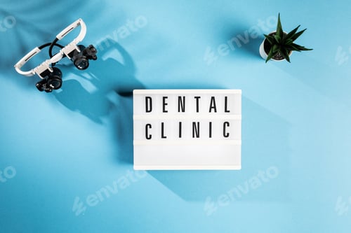 Preview: Dental Clinic sign on Blue Background