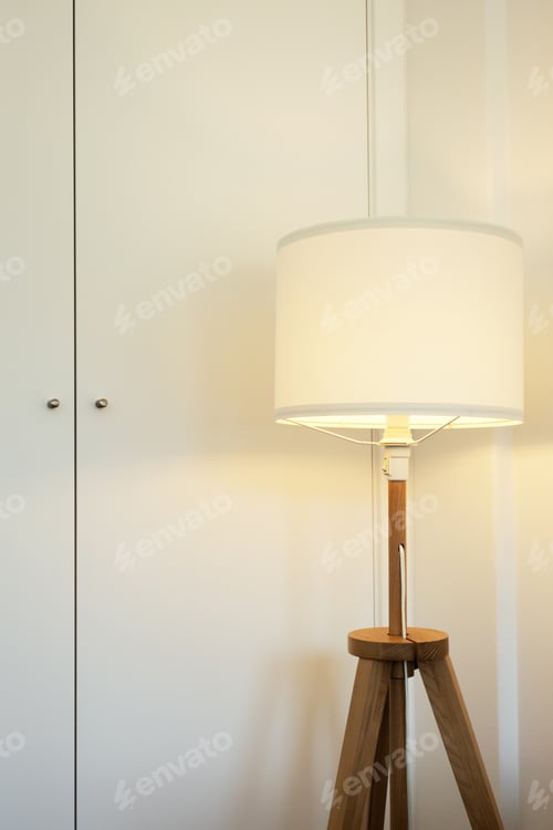 Preview: White floor lamp lights up minimalist interior