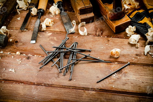 Preview: Construction nails on the table.