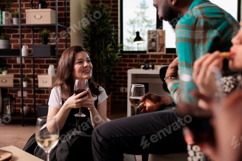 Preview: Friendly diverse people celebrating birthday while enjoying drinking alcoholic beverages