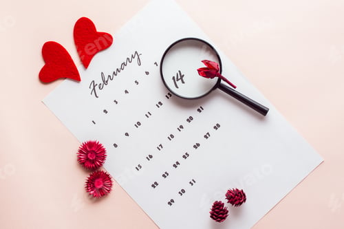 Preview: The magnifier highlights the date February 14 on the calendar sheet. Top view