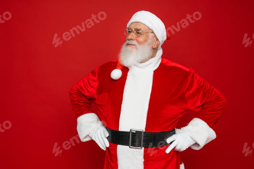 Preview: Portrait Santa Claus looking aside away on Merry Christmas, Happy New Year isolated red background