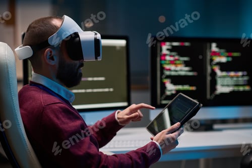 Preview: Bearded Man Wearing VR Headset in Blue Lights