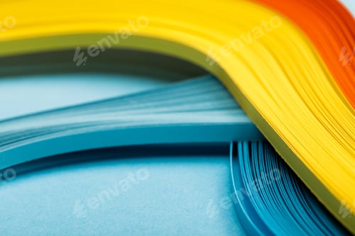 Preview: close up of yellow, orange and blue abstract bright lines on blue background