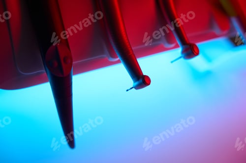 Preview: Cut photo of dentist block with drill. Treatment, brushing, prosthetics