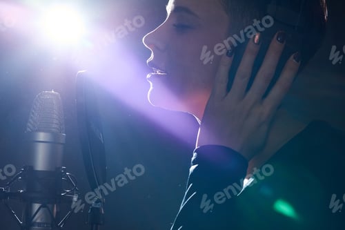 Preview: Emotive girl singing with microphone