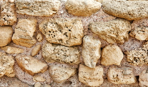 Preview: Background of the stone wall of the castle made of stones of different shapes and sizes and textures