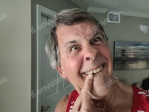 Preview: Senior getting ready for a happy selfie but soon turns into a funniest selfie.