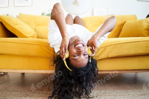 Preview: Looking at the camera of beautiful motivated young woman excited at home