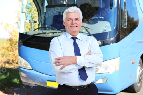 Preview: Professional driver standing near bus. Passenger transportation