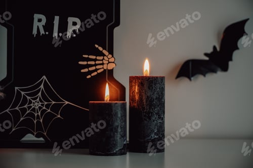 Preview: Closeup dark halloween banner with candles and moody decorations
