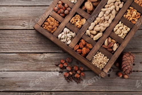 Preview: Various nuts in wooden box