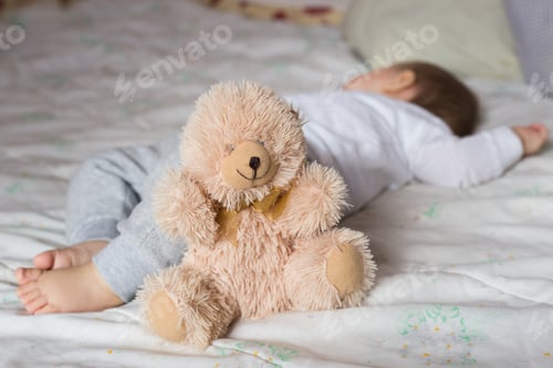 Preview: Baby sleeping in bed