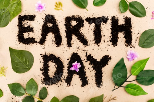 Preview: Top view of earth day lettering with leaves and buds on beige background