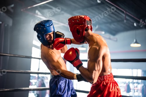 Preview: Two young professional boxer having a competition tournament on stage.