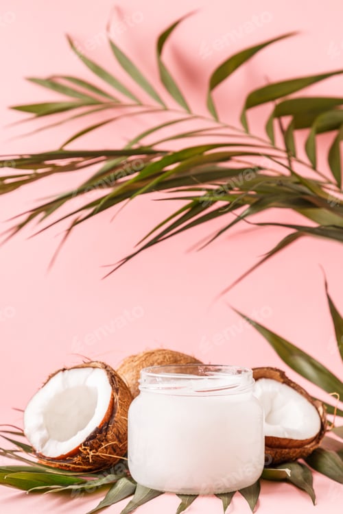 Preview: Coconut oil and coconuts on a bright pastel background.