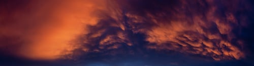 Preview: Dramatic Panoramic View of a cloudscape during a dark and colorful sunset