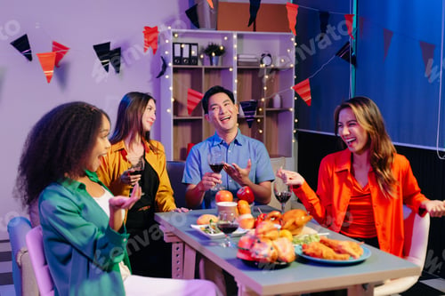 Preview: Celebration with friends enjoying food, drinks, and laughter at a lively house party.