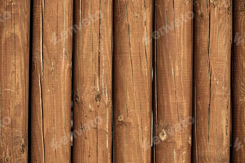 Preview: The texture of the logs. Wall of a rural house made of wooden logs with knots. Wooden background