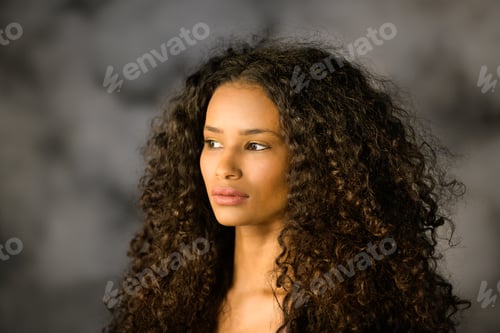 Preview: Headshot of a beautiful thoughtful black girl