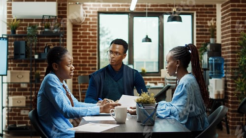 Preview: Startup workers reviewing documents