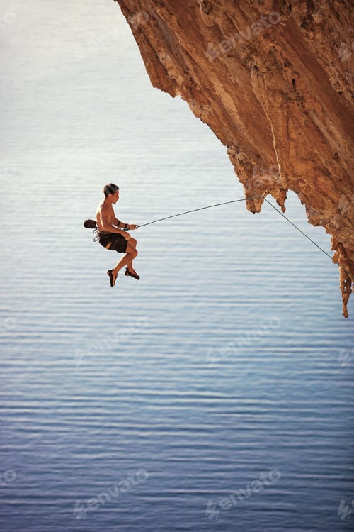 Preview: Rock climber falling of a cliff while lead climbing